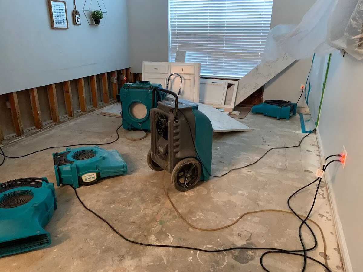 Dehumidifier in flood-cut room for Water Damage Restoration in Elk Plain